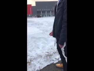 The boy, saying goodbye to the winter, decided to masturbate on the street